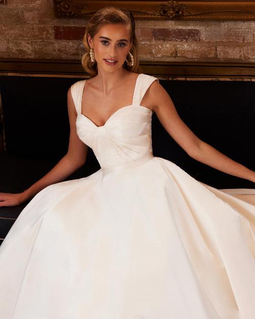 La22233 satin ball gown wedding dress with pockets and buttons down the train1